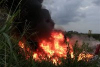 تلاش برای مهار آتش برای مهار آتش در تالاب انزلی